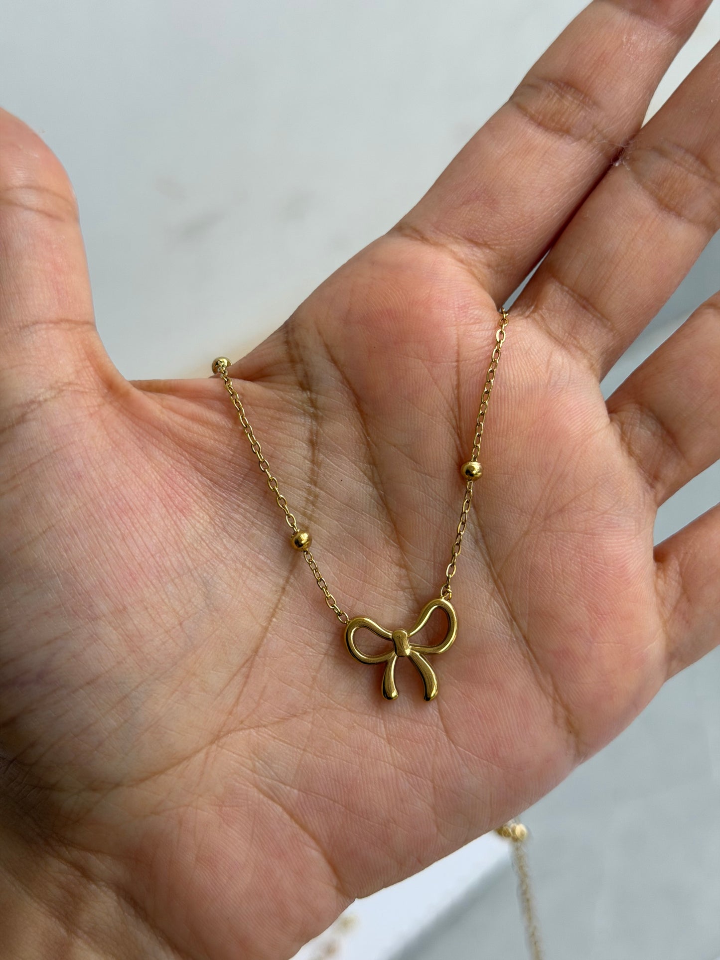 Cute bow pendant